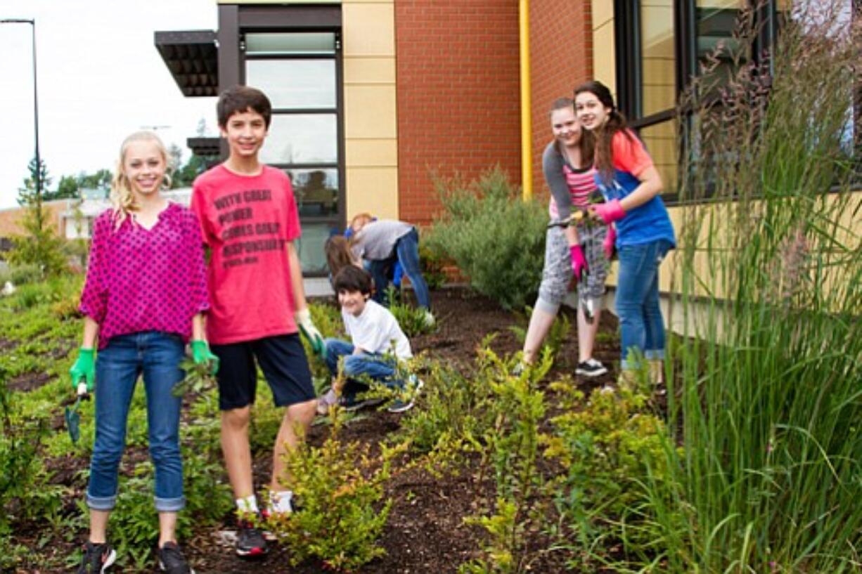 Ridgefield: South Ridge Elementary School sixth-graders came up with the idea for South Ridge Cleanup Day after studying Earth Day, and spent time working around South Ridge's campus to improve the school's appearance.