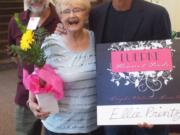 Hazel Dell South: Ellie Printz, center, with her son Randy Printz, right, was the first honoree from Luepke Flowers' &quot;Because We Care&quot; program, where each month store owner Bruno Amicci, left, will bring a bouquet of flowers to a resident of an assisted living community.