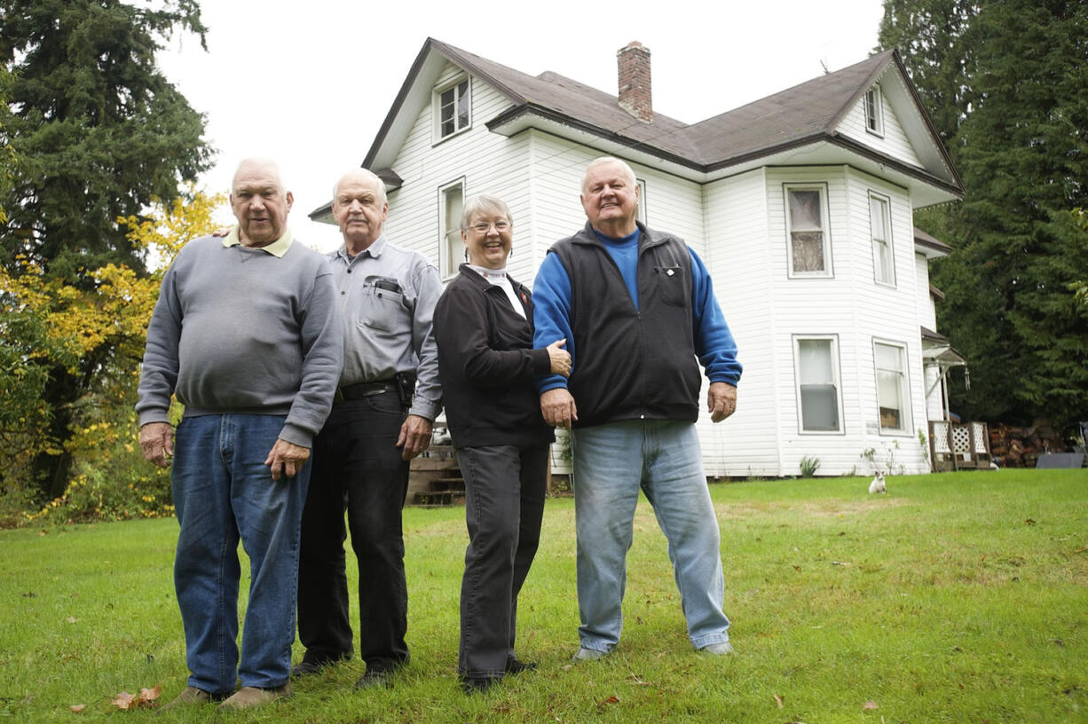 The Johnson family, from left, Dave Johnson, Jerry Johnson, Judy Steigmann, and Darrell Johnson, shown in Yacolt.