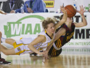 Jozie Tangeman , right, fights for a loose ball with West Seattle's IzzyTurk as Prairie loses to West Seattle 54-45 at the 2015 WIAA Hardwood Classic 3A Girls tournament at the Tacoma Dome, Friday, March 6, 2015.