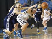 Hannahjoy Adams fights for a lose ball as Skyview looses to Bellarmine Prep 51-35 at the 2015 WIAA Hardwood Classic Girls 4A tournament at the Tacoma Dome, Friday, March 6, 2015.