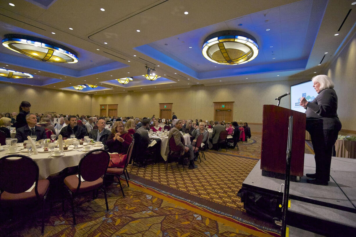 Long-standing board member and guest of honor Cheryl Pfaff thanks the crowd during the 15th annual fundraising luncheon for the Council for the Homeless, held at the Hilton Vancouver Washington on Thursday.