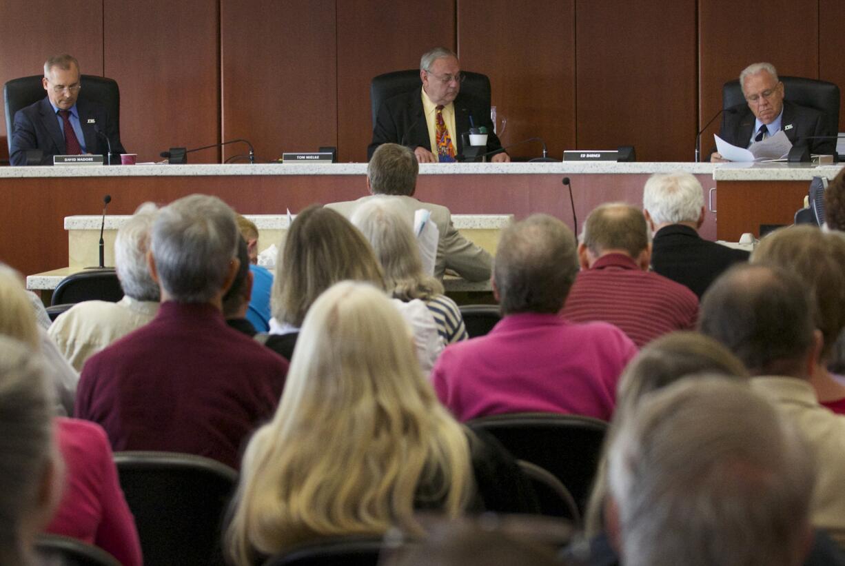 Clark County Commissioners listen to public comment during a hearing on Tuesday.