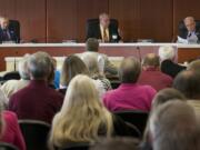 Clark County Commissioners listen to public comment during a hearing on Tuesday.