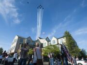 Six F-18 Hornet jet fighters fly Wednesday over the Harley H. Hall Building in Hazel Dell. The Blue Angel flyover was a salute to Harley Hall, a Vancouver aviator who was the Blue Angels' &quot;boss&quot; in 1970-1971.