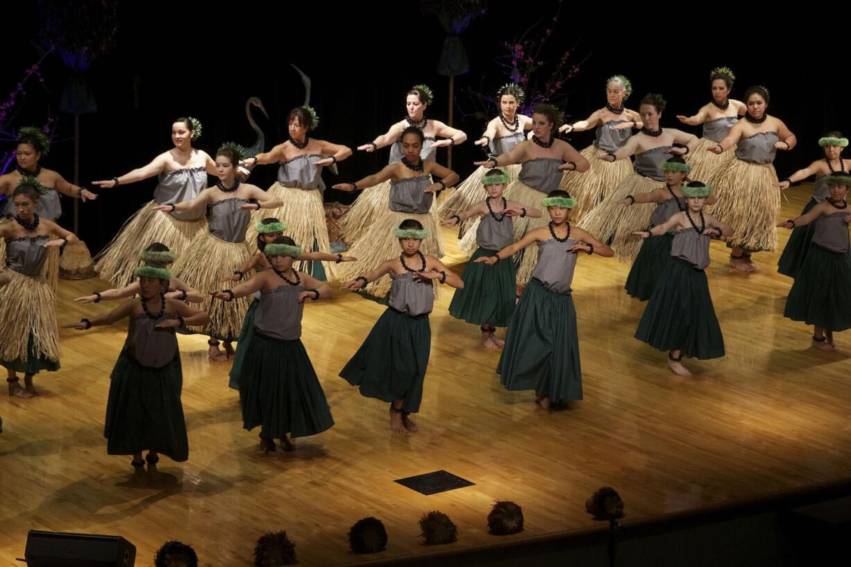 Wahine dancers from the Kaleinani o ke Kukui dance school perform during the Ke Kukui Foundation's Cultural Lu'au at Thomas Jefferson Middle School on Saturday.