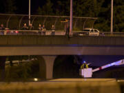 A suicidal man on the East 39th Street overpass prompts a massive I-5 shutdown Friday.