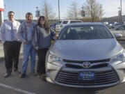 East Vancouver: Mary Brown and her son David Cox, center, picked up a 2015 Toyota Camry they won through Dick Hannah Dealerships' &quot;Keys to our Heart&quot; raffle, which raised $87,500 for the Children's Cancer Association.