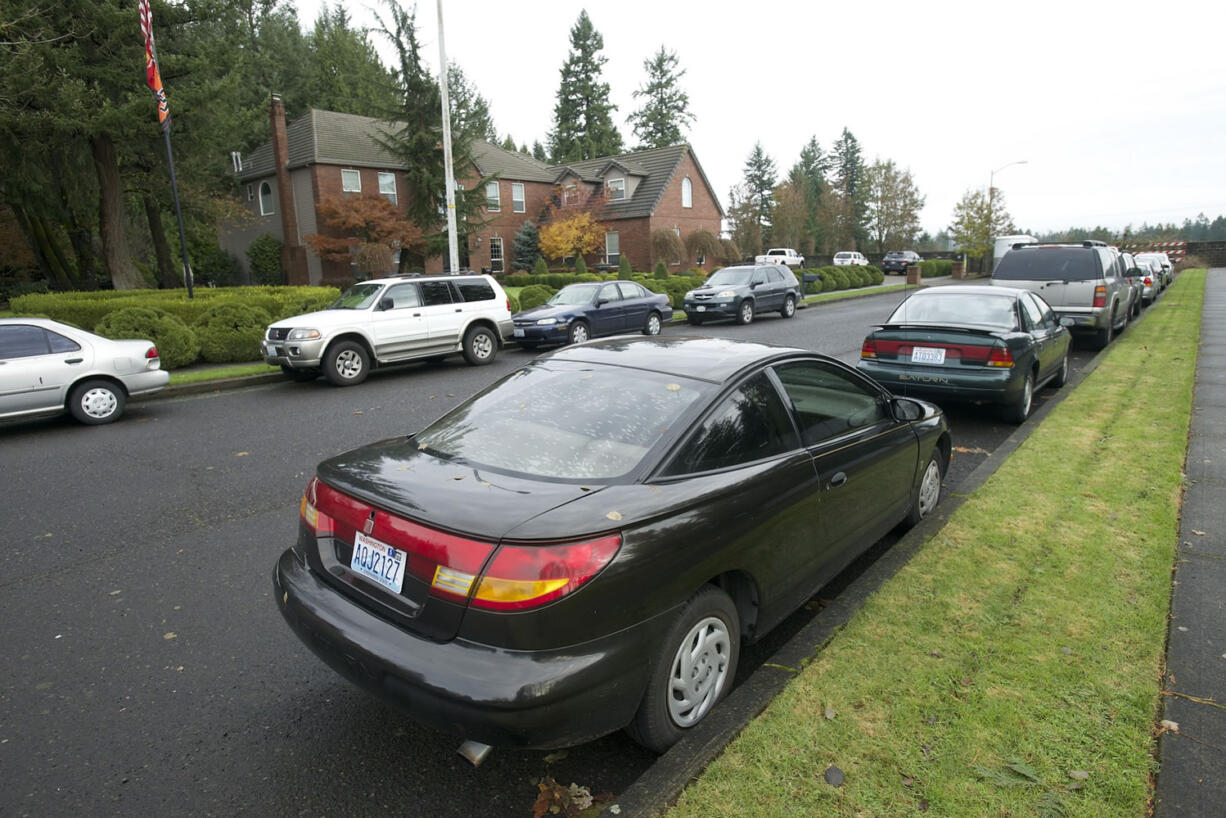 Cars line the streets in the Regency Park subdivision near Union High School.