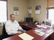 Curtis Shuck, senior sales director for the Port of Vancouver, talks to The Columbian inside the port's Williston, N.D. office on  Aug.