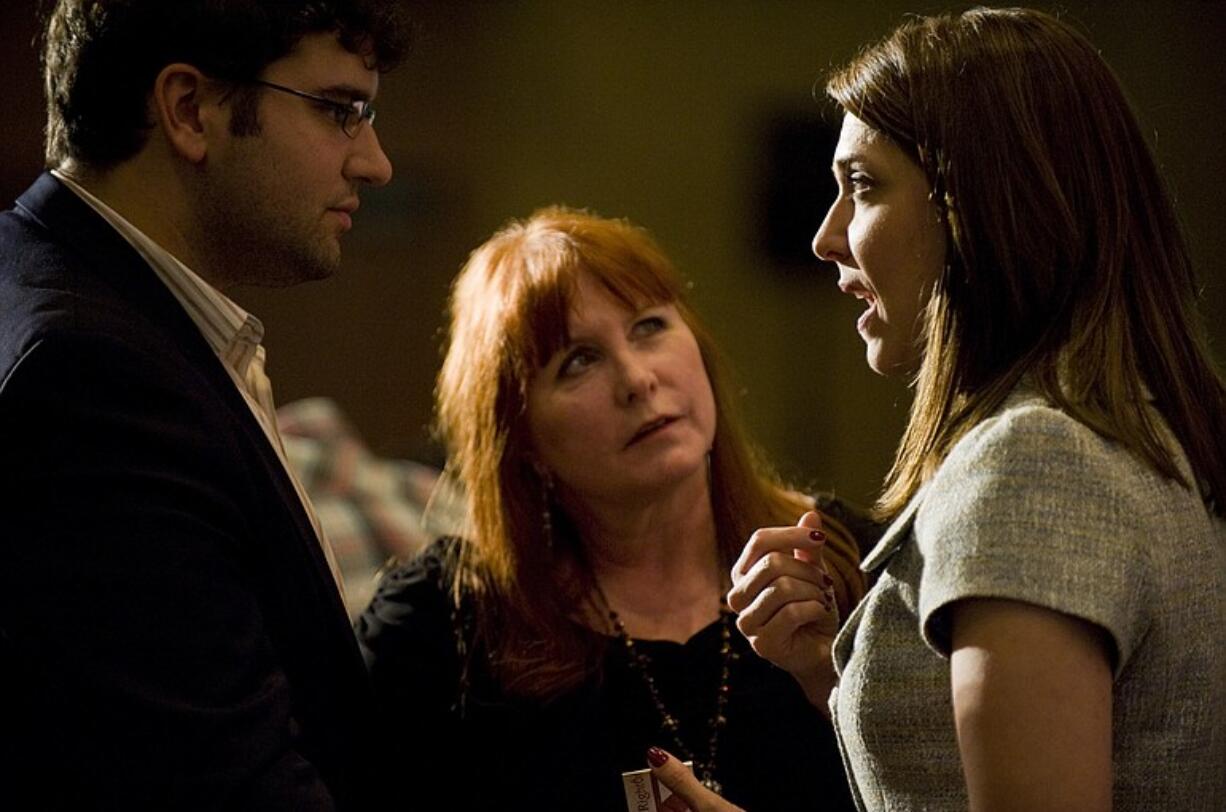 Jaime Herrera, right, talks with Erik Telford, left, deputy director of communications for Americans for Prosperity and executive director of its RightOnline program, and Nansen Malin at the Washington State Republican Convention, June 11, 2010.