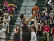 Fort Vancouver's Jordan Suell drives to the basket against Evergreen on Friday.