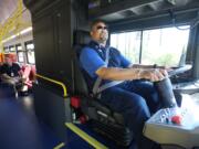 C-Tran bus driver Larry Moore has been testing the all-electric bus.