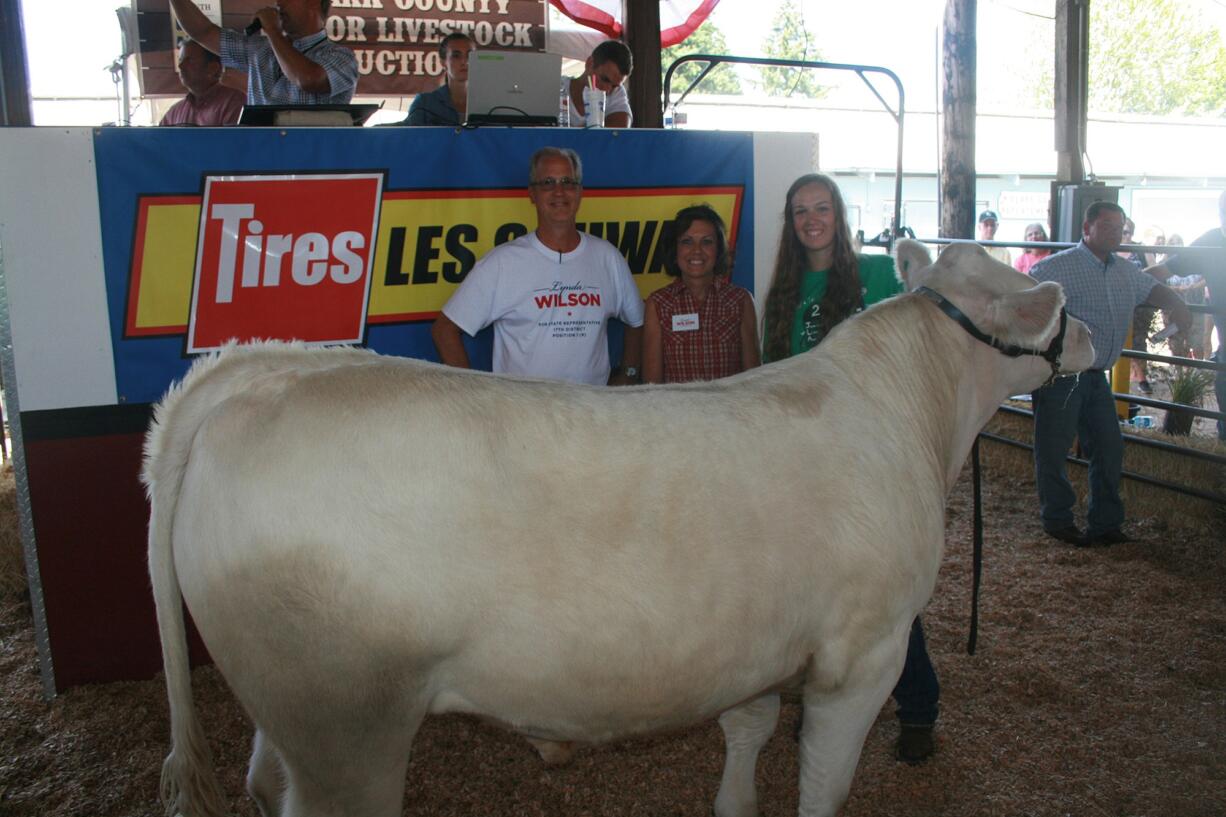 Ridgefield: Ali Serface with her steer, which she sold for Youth Efforts Against Hunger at the Clark County Fair last year.