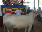 Ridgefield: Ali Serface with her steer, which she sold for Youth Efforts Against Hunger at the Clark County Fair last year.