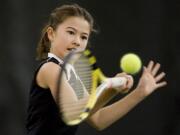 Julia Haynes, 10, shown at Club Green Meadows last week, recently won the Little Mo National Tennis Tournament.