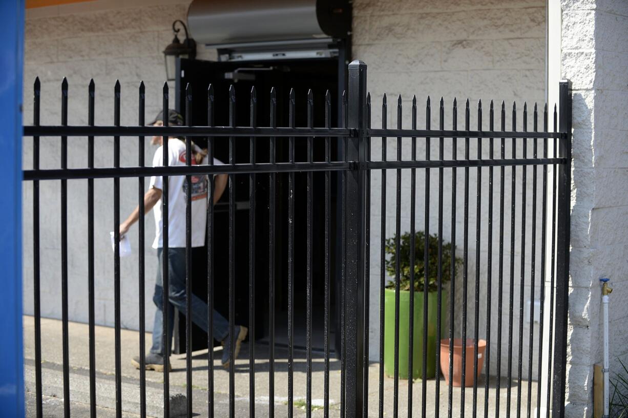 New Vansterdam has added extra security, such as this fence near the exit of the store in the Vancouver Heights neighborhood.