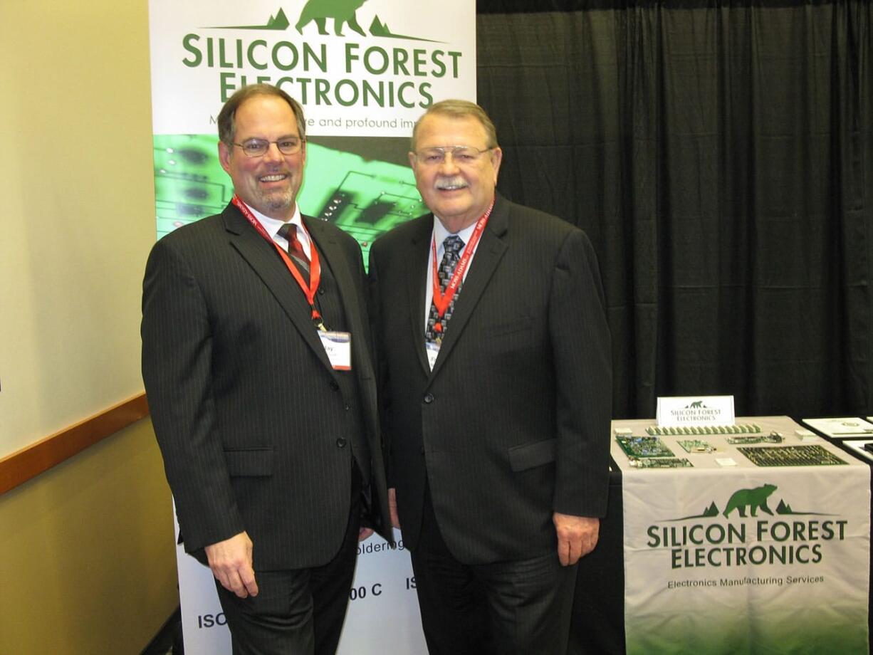 Jay Schmidt, left, executive vice president and general manager of Silicon Forest Electronics in Vancouver, will attend the 51st International Paris Air Show.