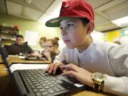 Wy'east Middle School sixth-grader Angel Amador, 12, uses a Chromebook to take a Smarter Balanced math practice test on Monday.