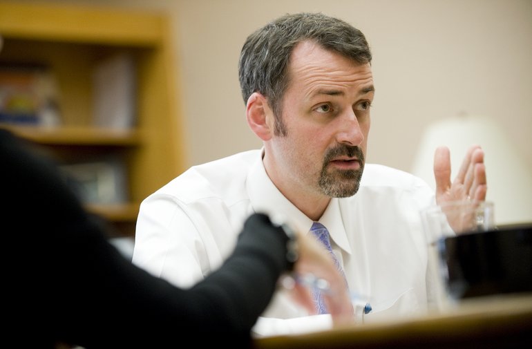 Vancouver City Manager Eric Holmes, then new at the job, meets with staff in his office at City Hall in November 2010.