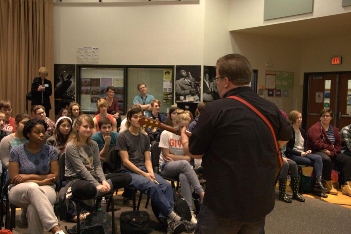 Shumway: Jason Deere of The Nashville Tribute Band performs at a workshop for Vancouver School of Arts and Academics.