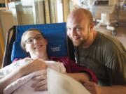 Kadie and David Warner are the new parents of spontaneous triplets born at PeaceHealth Southwest Medical Center.