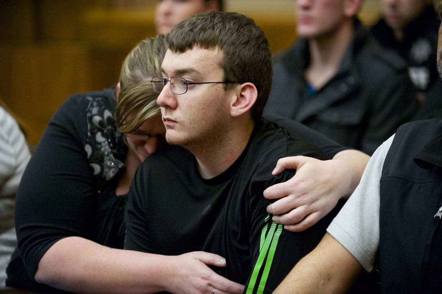 Janette Chumley embraces her son, Justin Carey, after Shaun Johnson was found guilty of vehicular assault in April.