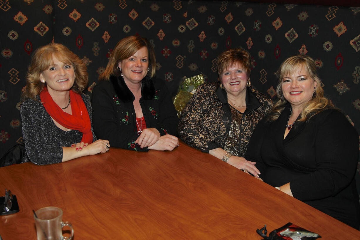 Denice Nolan, from left, Cindy North, Teresa Leininger and Janice Roley gather at Black Angus Steakhouse in Vancouver to celebrate Christmas and family.