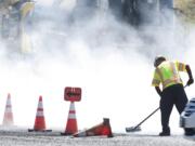 A crew from Intermountain Slurry Seal, Inc.