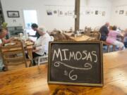 Diners eat Sunday brunch at the Farm Kitchen and Taproom at Joe's Place Farms in Vancouver.