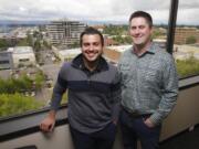 Photos by Steve Dipaola for the Columbian
DiscoverOrg co-founders Henry Schuck, left, and Kirk Brown have chosen downtown Vancovuver as the corporate home for their technology company, saying it offers large advantages over Portland. &quot;It is nice to feel that our presence here is making a real impact on the city,&quot; Schuck says in an essay.