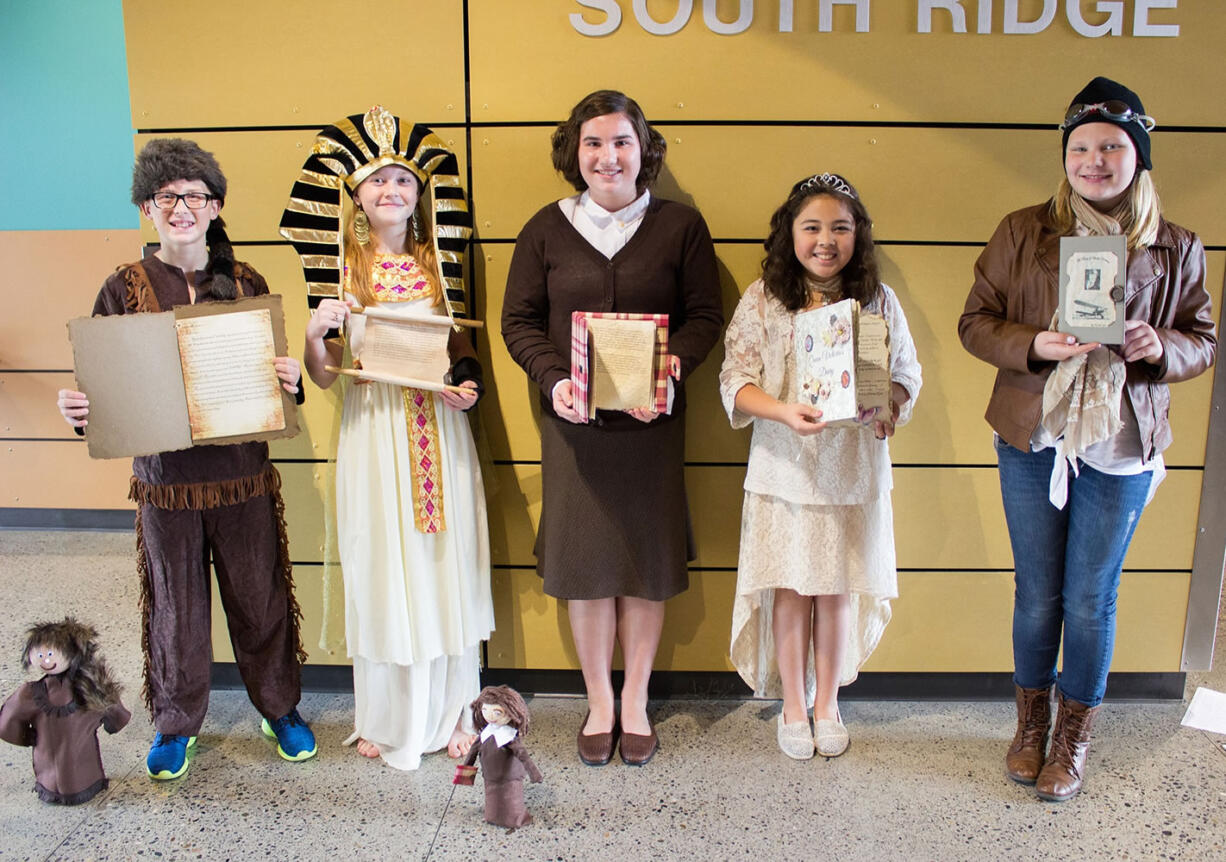 Ridgefield: Nick Radosevich as Meriwether Lewis, Taylor Skinner as Cleopatra, Jaelyn Sotelo as Anne Frank, Cami McGravey as Queen Victoria and Maddy Bisla as Amelia Earhart for a recent biography project at South Ridge Elementary School.