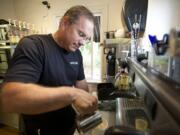 Latte Da Coffeehouse and Wine Bar owner Scott Flury was a victim of vandalism last year.