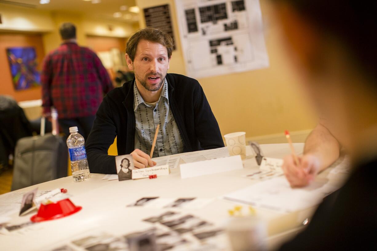 Michael Rude plays Night Witches, a new indie role-playing game based on World War II female fighter pilots in the Soviet army, while at GameStorm on Sunday at the Hilton Vancouver Washington.