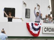 Nancy Curcio, left, celebrates Saturday immediately after christening Crown Point -- the newest towboat of Tidewater Transportation and Terminals -- at Vancouver's Terminal 1 along the Columbia River.