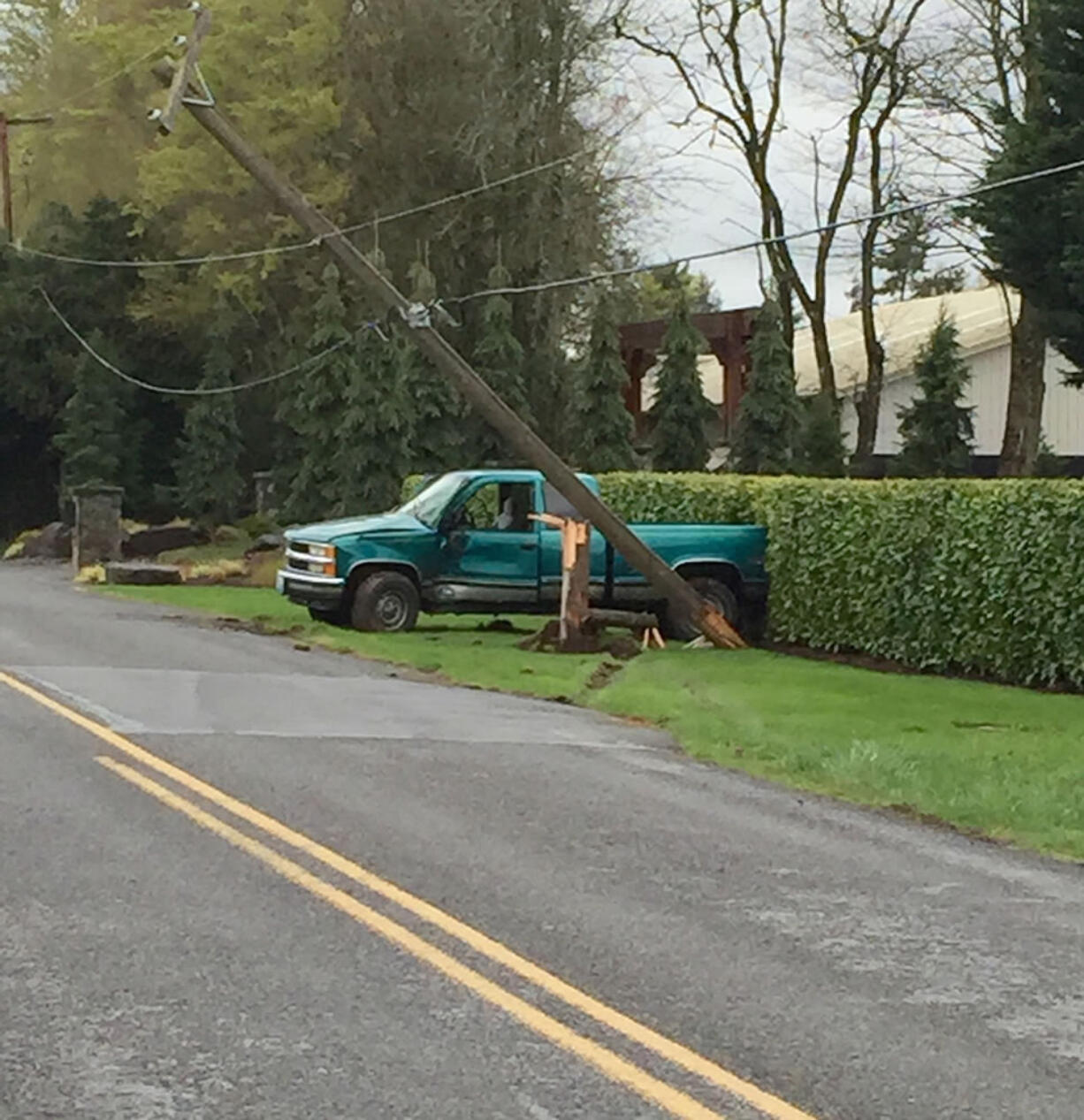 Tim Dawdy/Clark County Fire 
A pickup driver struck and severed a utility pole Wednesday while driving south of La Center.