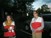 Clark County: Hudson's Bay High School seniors and Red Cross Youth Club members Hunter Simpson, left, and Jase Murphy prepare to &quot;Trick-or-Treat for Disaster.&quot; About 160 high-schoolers from Clark County collected donations from residents on Halloween instead of candy.