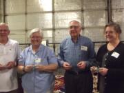 Fruit Valley: Friends of the Carpenter volunteers Bob Tait (left), Barbarita Gately, David Cambrey and Kate McCarthy were honored in April for faithfully building simple water thermometers that help people avoid waterborne diseases.