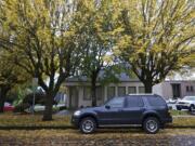 An SUV parked at a permit parking spot on East 16th Street at E Street on Thursday October 23, 2014.