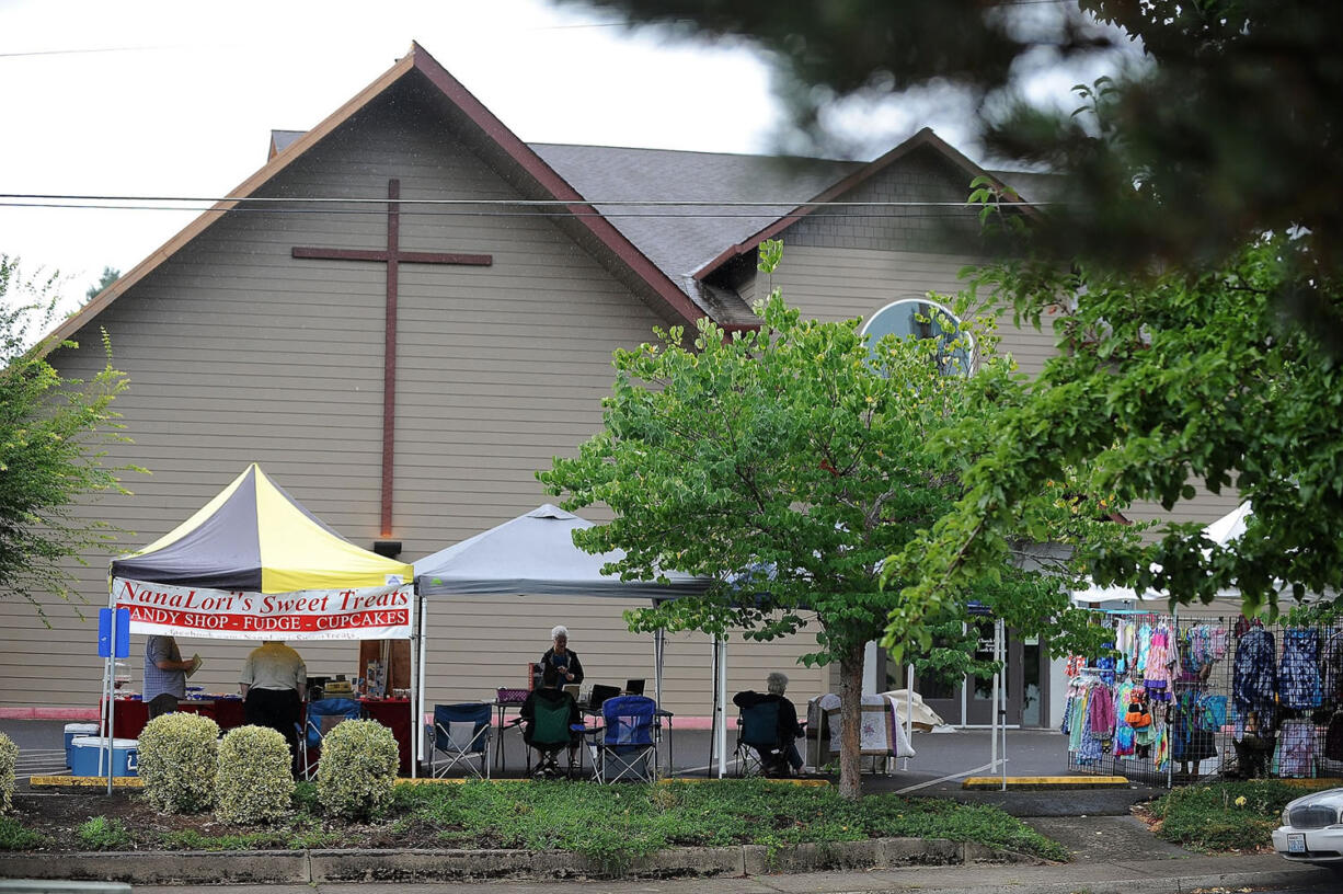 My Farmers Market vendors at La Center Evangelical Free Church wait for customers in the parking lot on Aug.