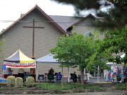 My Farmers Market vendors at La Center Evangelical Free Church wait for customers in the parking lot on Aug.