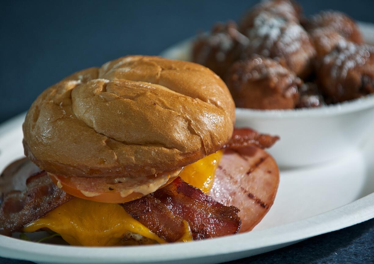 The Flat Liner burger and apple fritters at Burger Bungalow in Vancouver.