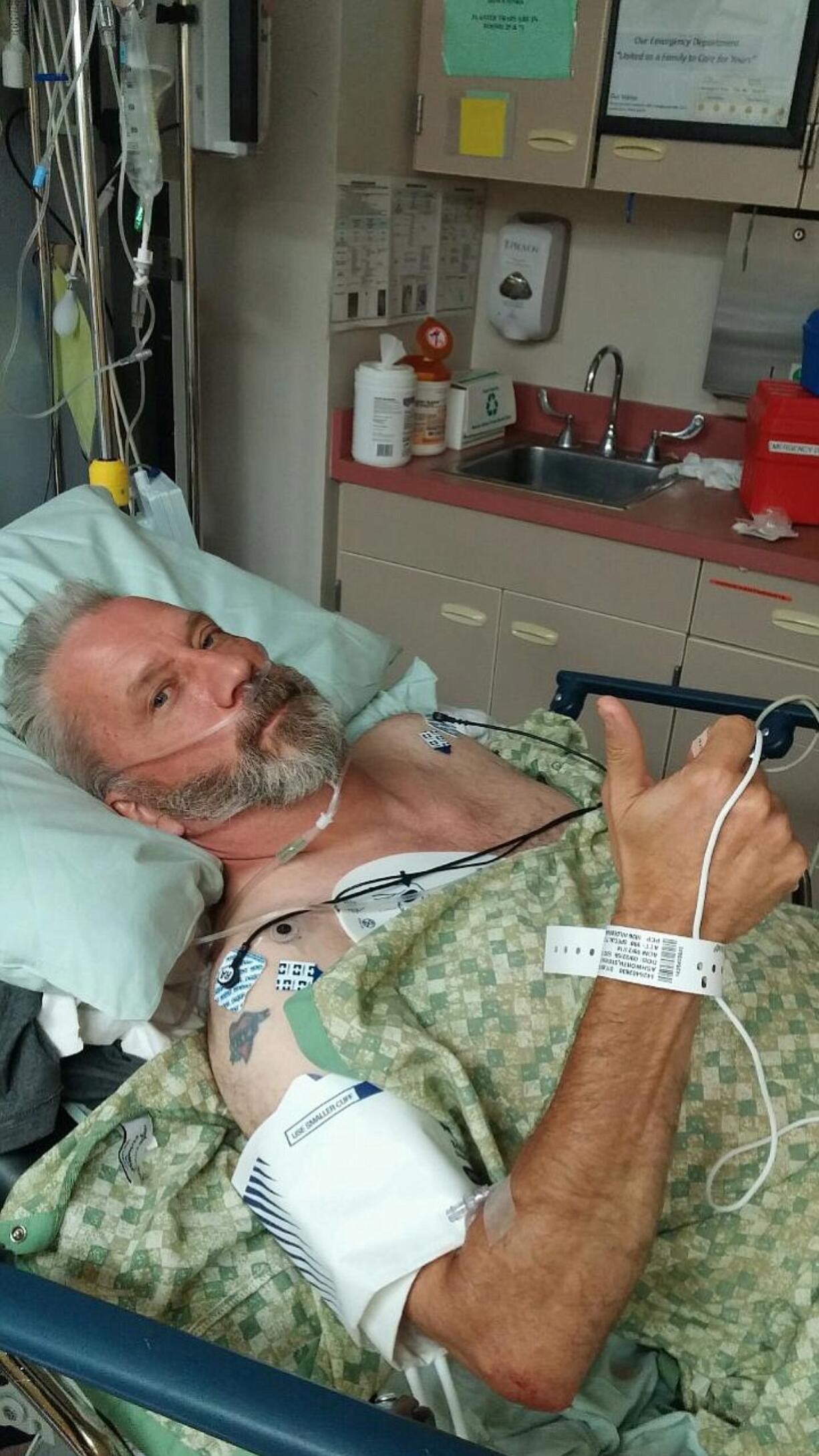 Bennington: Steven Ashworth, 57, gives a thumbs up after recovering from cardiac arrest on Sept. 21.