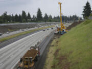 Photos by Ariane Kunze/The Columbian
Construction crews are building a new interchange at Interstate 205 and Northeast 18th Street in Vancouver. Currently, there are no interchanges on I-205 between Southeast Mill Plain Boulevard and state Highway 500.