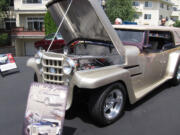 Cascade Park East: Bary Garrigues's 1948 Willy's Jeepster custom street rod earned the People's Choice Award at the eighth annual Touchmark Car Show