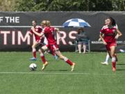 The Washington Timbers G98 Red team plays on a new turf soccer field at the Harmony Sports Complex, Friday, June 26, 2015.