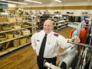 Salvation Army Capt. Dennis Earnhart discusses the new 'family store' on Northeast Fourth Plain Boulevard on Monday.