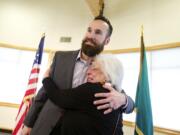 Officer Dustin Goudschaal reunited with  Earlene &quot;Sam&quot; Anderson on Wednesday for the Vancouver Police Department's Recognition and Awards Ceremony at the Water Resources Education Center.  Goudschaal received the Purple Heart for an incident in which he was shot several times during a traffic stop.