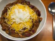 A bowl of red chili with beans, beef, cheese and onions is served at The Hoosegow, a new restaurant just south of the courthouse.