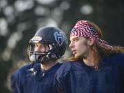 Hockinson defensive lineman Peter Schultz-Rathbun, right, is back with the team after missing last season due to a brain tumor.